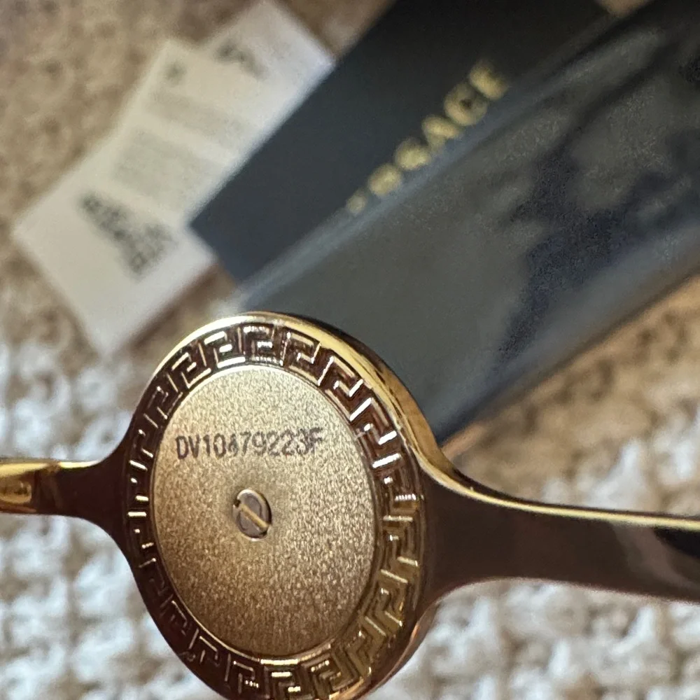 Versace Gold Metal Frame Sunglasses with Brown Lenses